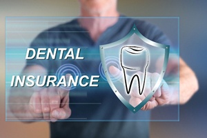 Dental insurance written on glass