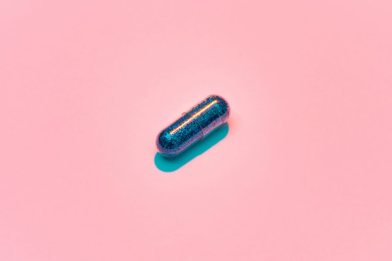pill on a pink background
